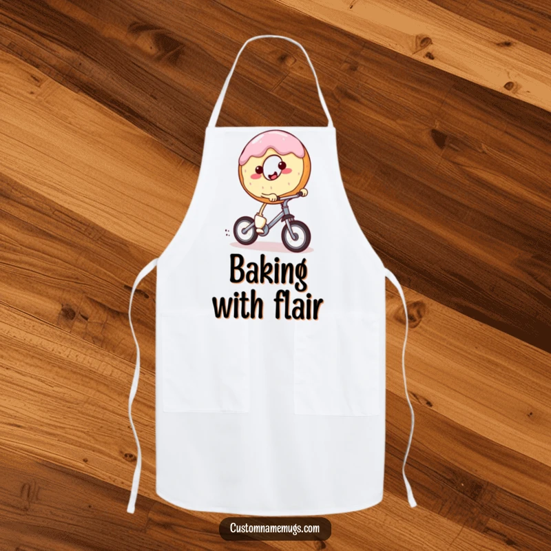 Funny chef apron with a smiling, round donut character with tiny legs riding a miniature unicycle. Great for kitchen fun.