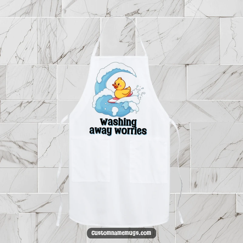 Funny Apron: Tiny, determined rubber ducky character bravely surfing a giant, bubbly wave of soap while cooking.
