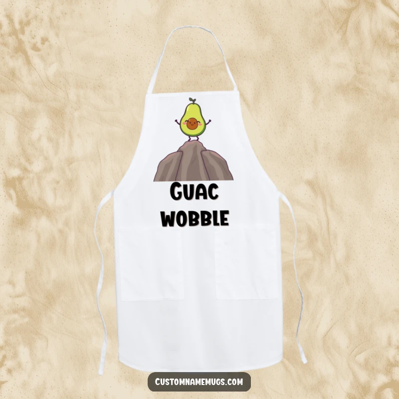 Funny apron depicting a giggling avocado balancing on its pit, adding humor to cooking tasks.