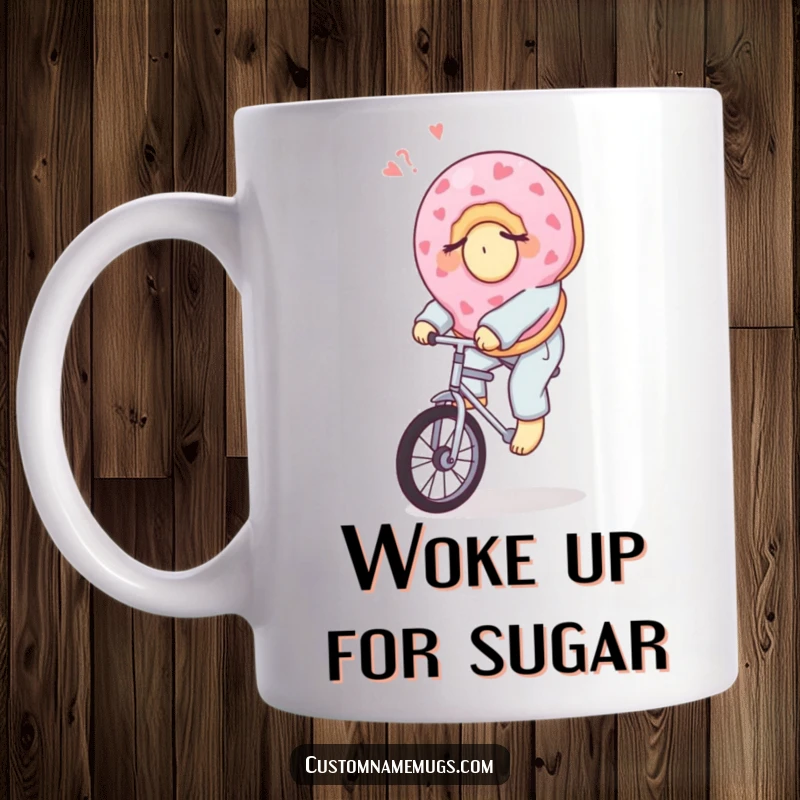 Funny donut mug showing a sleepy donut in pajamas attempting to ride a unicycle, symbolizing morning struggles and humor.