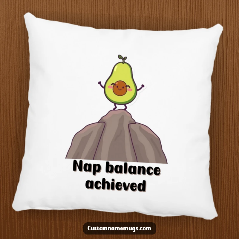 Funny pillow showing a giggling avocado character balancing on its pit, providing comfort and comical appeal.