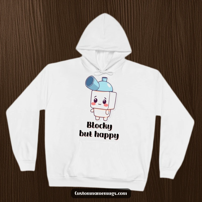 Funny hoodie with a happy, blocky character wearing a plunger as a hat, looking confused but delighted. Cozy humor.