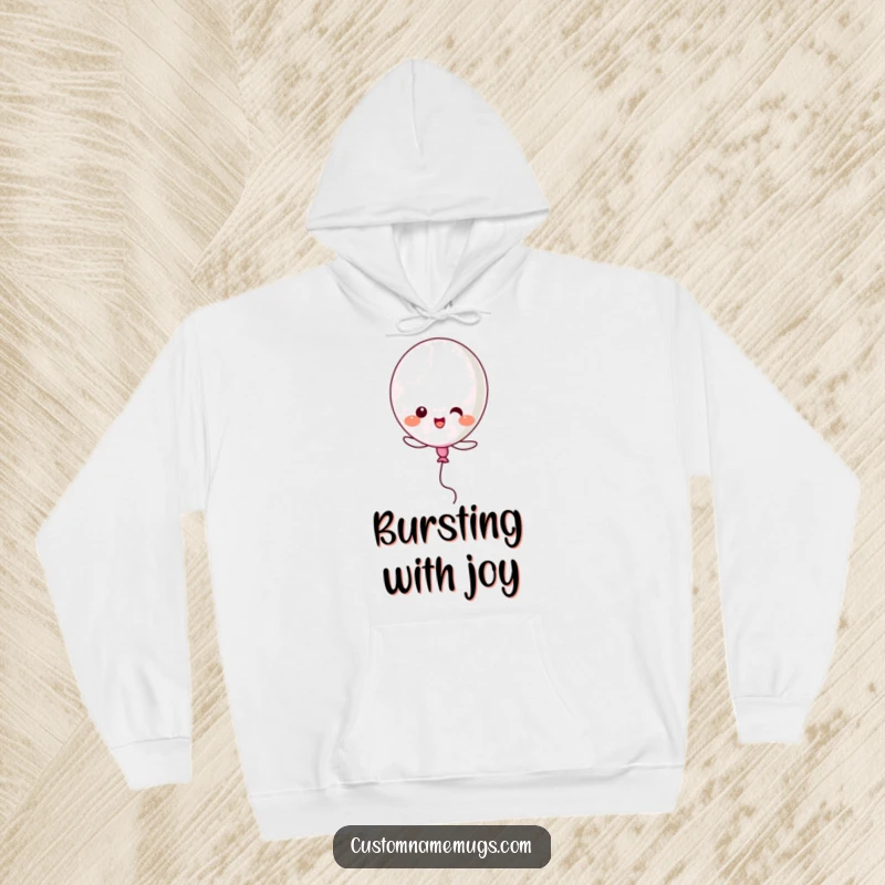 Funny Kawaii balloon character comically popping itself while trying to soar, a cozy and humorous hoodie.