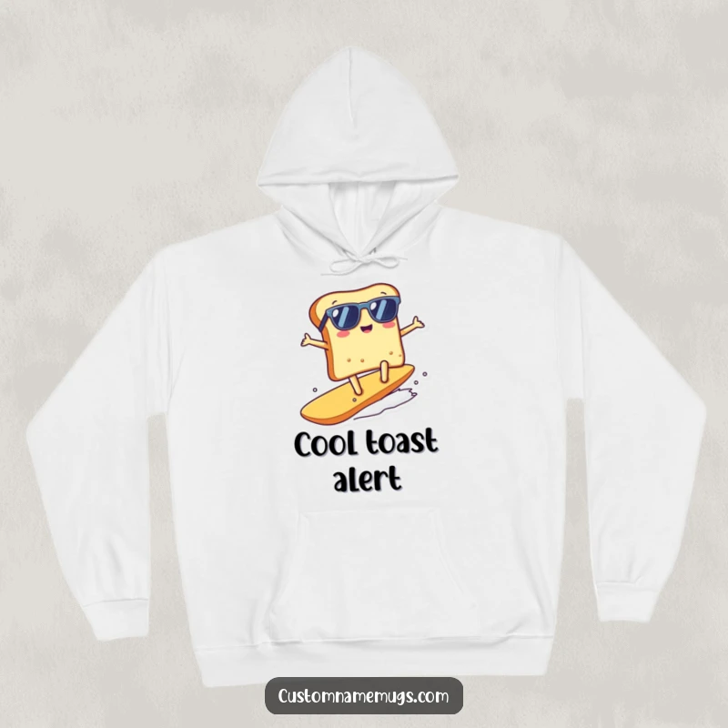 Funny kawaii toast character wearing sunglasses, surfing a crumb on a soft, warm hoodie, an amusing funny gift.