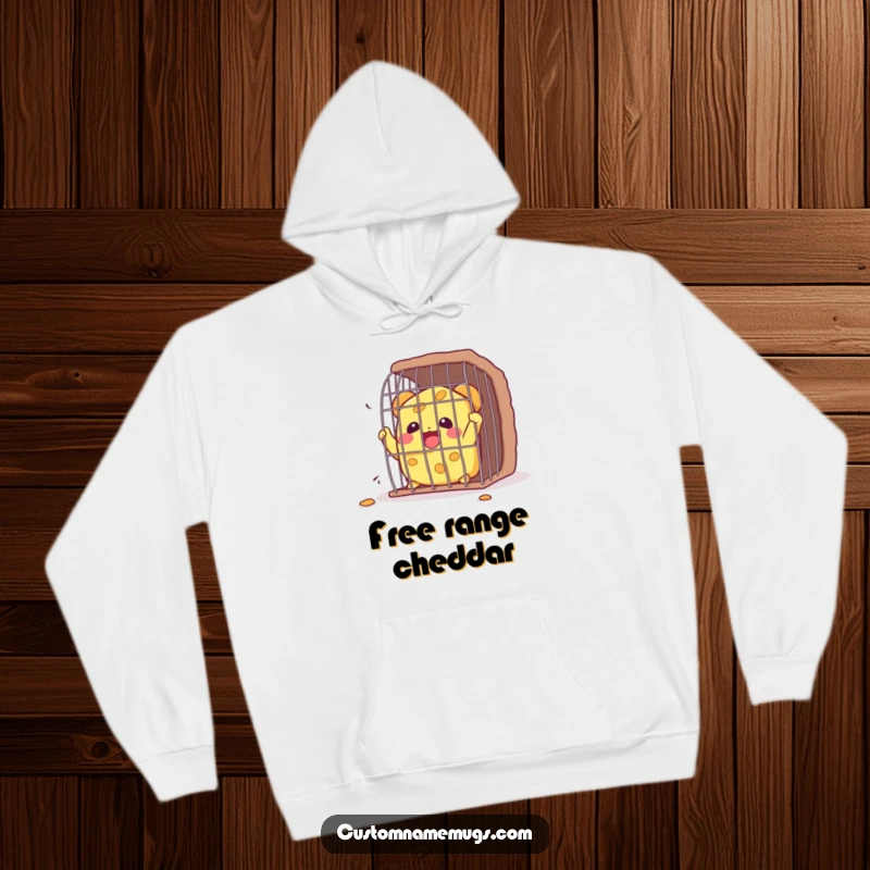 Funny Kawaii cheese character celebrating its escape from a small cage, a cozy and humorous hoodie perfect for cheese enthusiasts.