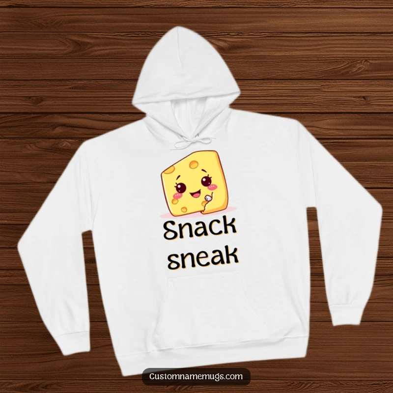 Funny hoodie featuring a mischievous cheese wedge character peeking from behind a giant cracker, cozy and comical.