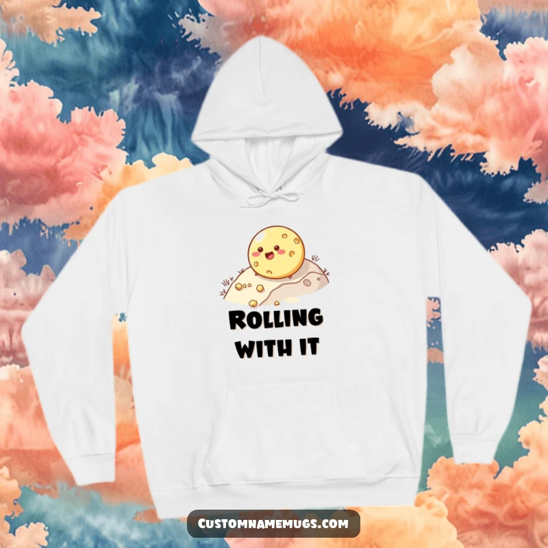 Funny hoodie with a happy, round cheese character rolling downhill, comically shedding pieces. Cozy, cheesy humor.