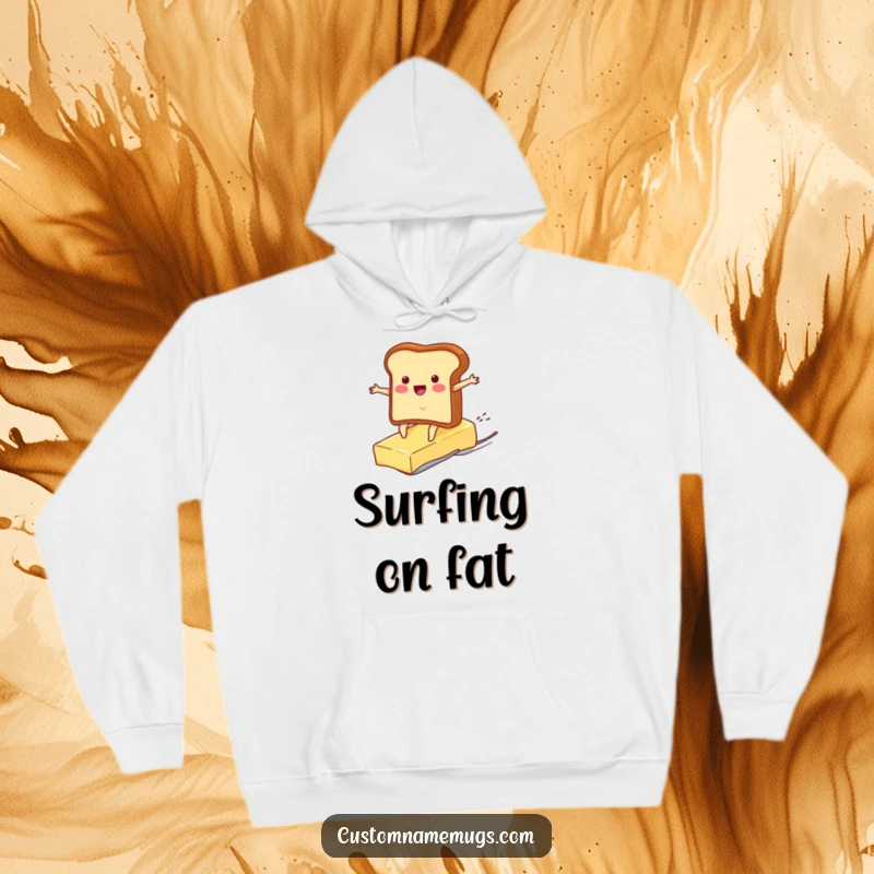 Funny hoodie depicting a determined toast character surfing a runaway pat of butter, a comical scene for cozy, humorous wear.