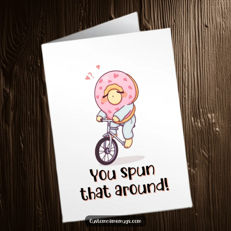 Funny Free Printable Congratulations Card: A sleepy donut in pajamas precariously riding a unicycle, symbolizing overcoming challenges with effort.