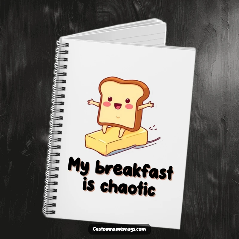 Funny notebook with a cheerful toast character surfing a runaway pat of butter, perfect for jotting down funny thoughts and ideas.