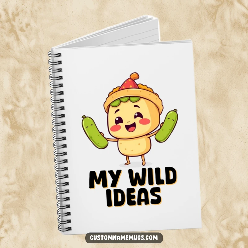 Funny Notebook: A smiling taco wearing a party hat juggles three large pickles, illustrating humorous fiesta.