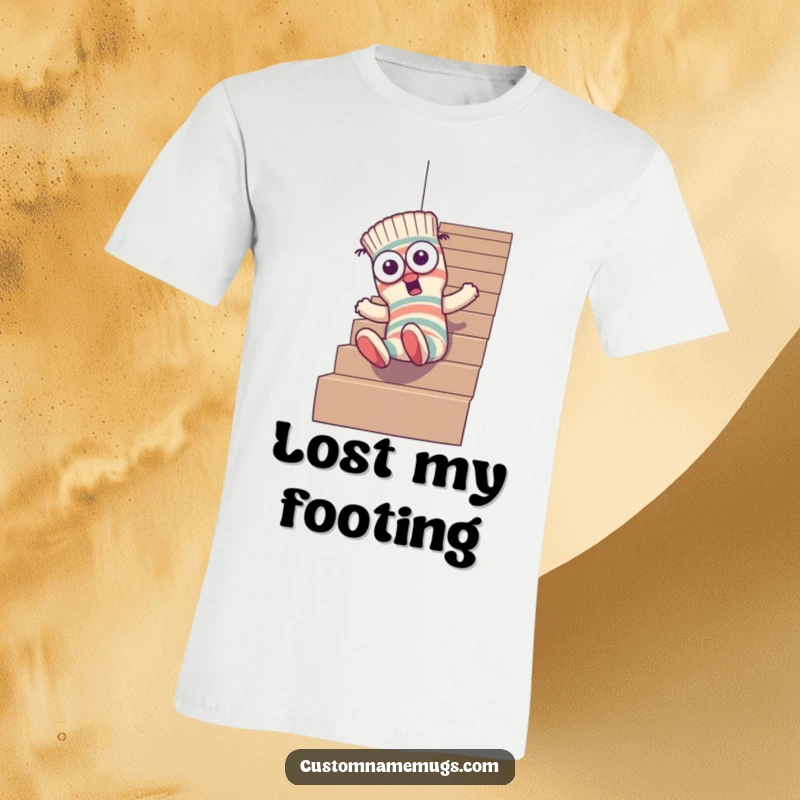 Funny t-shirt depicting a goofy sock character with uneven eyes comically tumbling headfirst down a set of stairs, a pure visual gag.