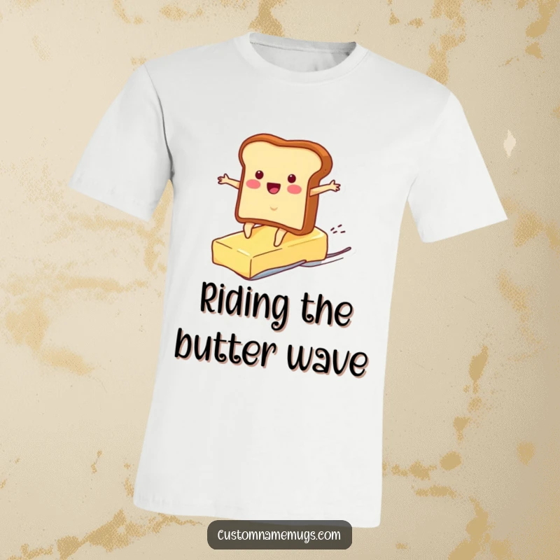 Funny t-shirt featuring a cheerful toast character attempting to surf on a fast-moving pat of butter, perfect for breakfast humor.
