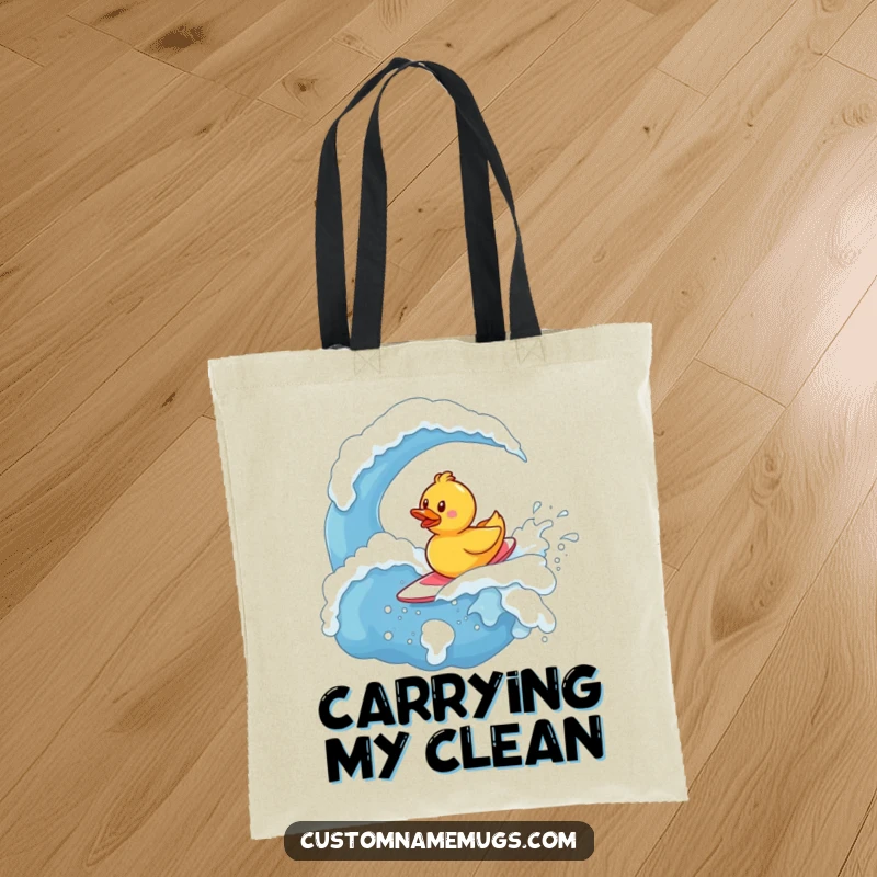 Funny Tote Bag: Determined little rubber ducky character bravely surfing on a giant, effervescent wave of soap.